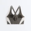 Reggiseno sportivo compressivo riflettente a sostegno rigido