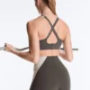 Reggiseno sportivo compressivo riflettente a sostegno rigido