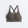 Reggiseno sportivo compressivo riflettente a sostegno rigido