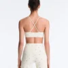 Reggiseno sportivo Evermove a sostegno leggero con stampa floreale