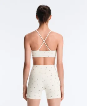 Reggiseno sportivo Evermove a sostegno leggero con stampa floreale