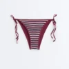 Slip bikini a copertura media a righe testurizzate con lacci