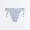 Slip bikini a copertura media a righe testurizzate con lacci