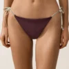 Slip bikini a copertura media con lacci Slip bikini a copertura media con lacci