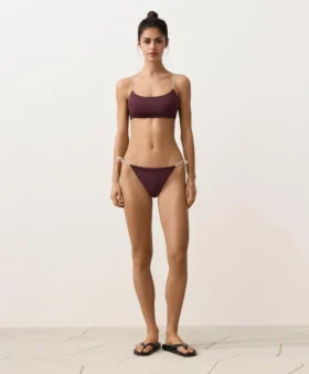 Slip bikini a copertura media con lacci