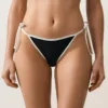 Slip bikini a copertura media con lacci e bordi a contrasto