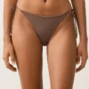 Slip bikini a copertura media con lacci e stampa a mini pois