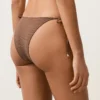 Slip bikini a copertura media con lacci e stampa a mini pois