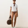 Slip bikini a copertura media con lacci e stampa a mini pois