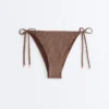 Slip bikini a copertura media con lacci e stampa a mini pois