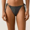 Slip bikini a copertura media con lacci in jacquard effetto lavato