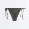 Slip bikini a copertura media con lacci in jacquard effetto lavato