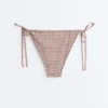 Slip bikini a copertura media con stampa mini metallizzata e lacci