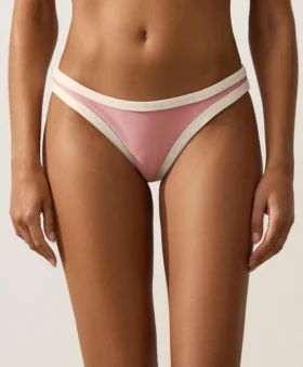 Slip bikini a copertura media con taglio a U e bordi a contrasto