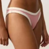 Slip bikini a copertura media con taglio a U e bordi a contrasto