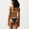 Slip bikini a copertura media con taglio a U e bordi a contrasto