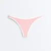 Slip bikini a copertura media con taglio a U e bordi a contrasto