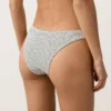 Slip bikini a copertura media con taglio a U in jacquard a pois Slip bikini a copertura media con taglio a U in jacquard a pois