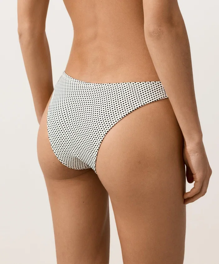 Slip bikini a copertura media con taglio a U in jacquard a pois Slip bikini a copertura media con taglio a U in jacquard a pois