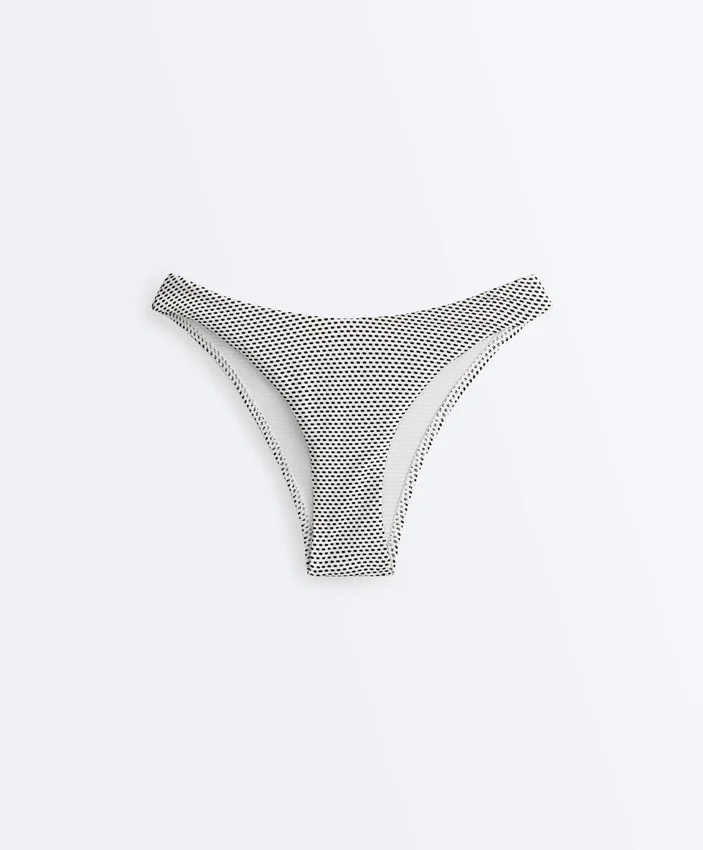 Slip bikini a copertura media con taglio a U in jacquard a pois Slip bikini a copertura media con taglio a U in jacquard a pois