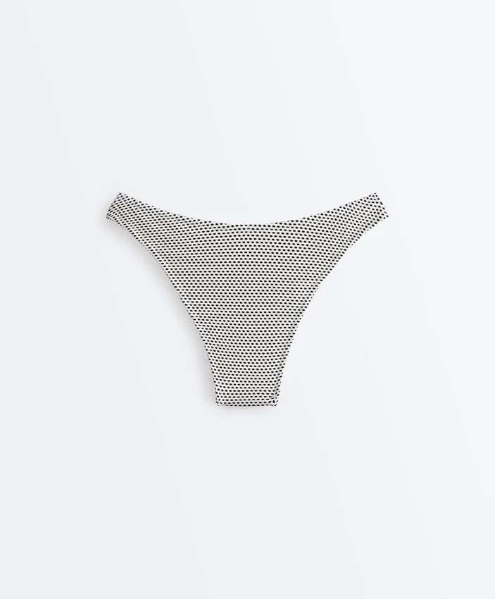 Slip bikini a copertura media con taglio a U in jacquard a pois Slip bikini a copertura media con taglio a U in jacquard a pois