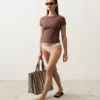 Slip bikini a copertura media con taglio a U in tessuto stropicciato Slip bikini a copertura media con taglio a U in tessuto stropicciato