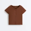T-shirt a maniche corte con zip T-shirt a maniche corte con zip