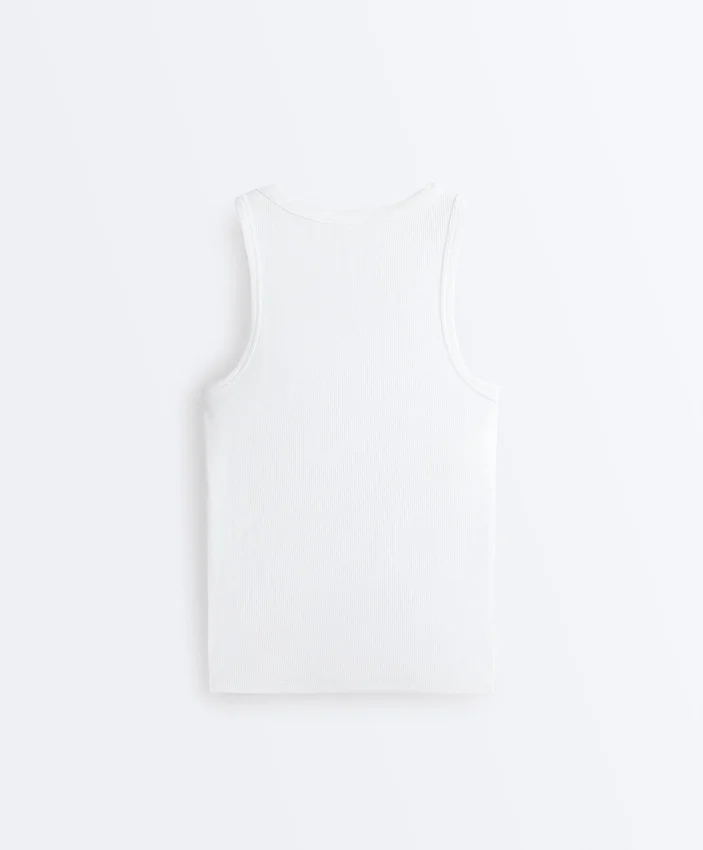 T-shirt aderente con spalline a costine in cotone e modal T-shirt aderente con spalline a costine in cotone e modal