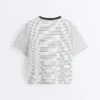 T-shirt boxy a maniche corte in misto cotone a righe T-shirt boxy a maniche corte in misto cotone a righe
