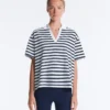 T-shirt boxy a maniche corte in misto cotone con collo a polo T-shirt boxy a maniche corte in misto cotone con collo a polo