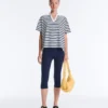 T-shirt boxy a maniche corte in misto cotone con collo a polo T-shirt boxy a maniche corte in misto cotone con collo a polo