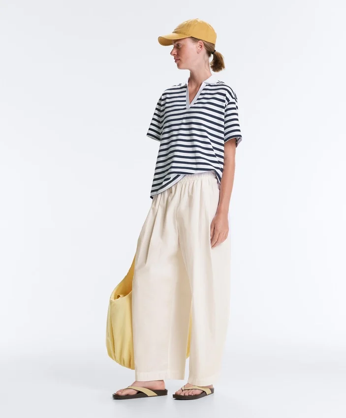 T-shirt boxy a maniche corte in misto cotone con collo a polo T-shirt boxy a maniche corte in misto cotone con collo a polo