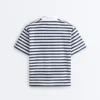 T-shirt boxy a maniche corte in misto cotone con collo a polo T-shirt boxy a maniche corte in misto cotone con collo a polo