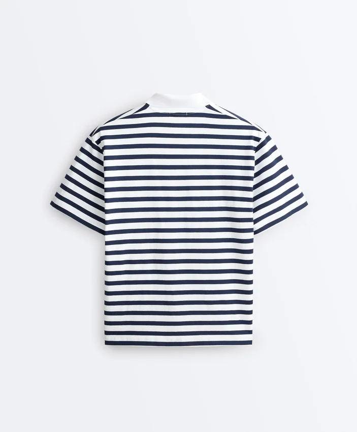 T-shirt boxy a maniche corte in misto cotone con collo a polo T-shirt boxy a maniche corte in misto cotone con collo a polo