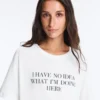 T-shirt boxy a maniche corte in misto cotone con slogan T-shirt boxy a maniche corte in misto cotone con slogan