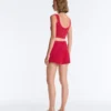 T-shirt corta in maglia lavata con spalline a trecce T-shirt corta in maglia lavata con spalline a trecce