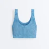 T-shirt corta in maglia lavata con spalline a trecce T-shirt corta in maglia lavata con spalline a trecce