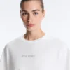T-shirt corta squadrata in misto cotone con slogan T-shirt corta squadrata in misto cotone con slogan