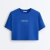 T-shirt corta squadrata in misto cotone con slogan T-shirt corta squadrata in misto cotone con slogan