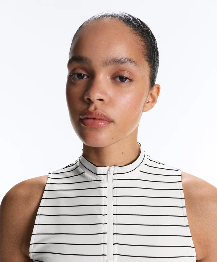 T-shirt senza maniche a righe con mezza zip T-shirt senza maniche a righe con mezza zip