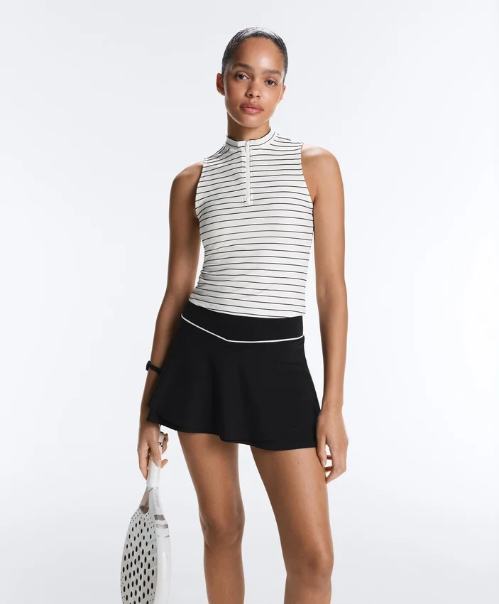 T-shirt senza maniche a righe con mezza zip T-shirt senza maniche a righe con mezza zip