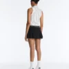 T-shirt senza maniche a righe con mezza zip T-shirt senza maniche a righe con mezza zip