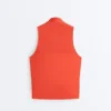 T-shirt senza maniche con mezza zip T-shirt senza maniche con mezza zip