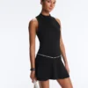 T-shirt senza maniche con mezza zip T-shirt senza maniche con mezza zip