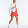 T-shirt senza maniche con mezza zip T-shirt senza maniche con mezza zip