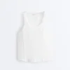 T-shirt senza maniche smockata senza cuciture T-shirt senza maniche smockata senza cuciture