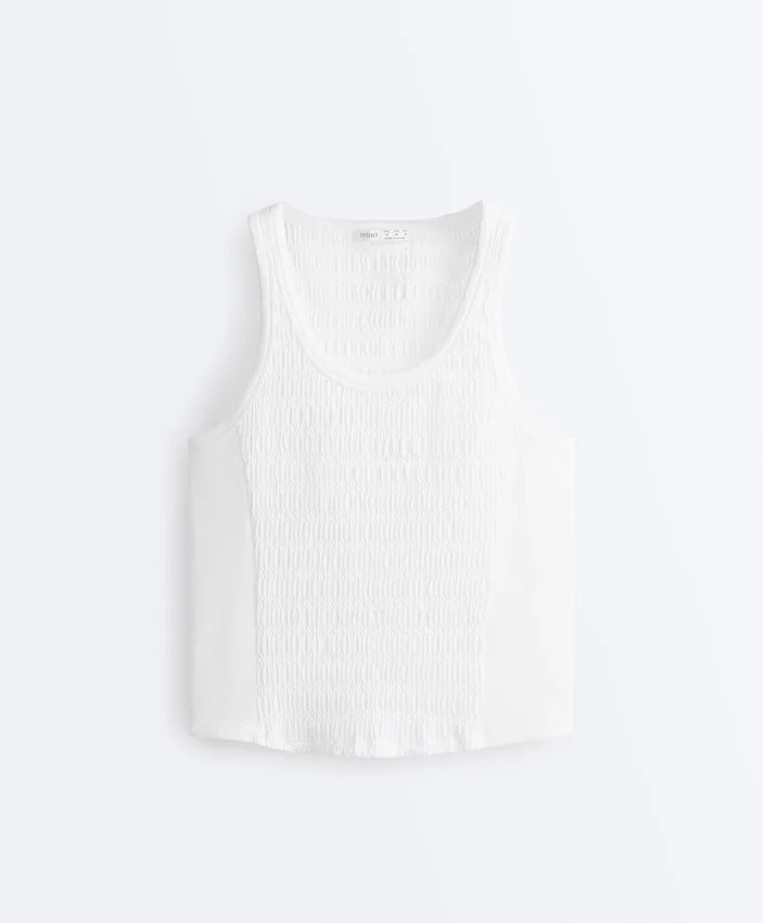 T-shirt senza maniche smockata senza cuciture T-shirt senza maniche smockata senza cuciture