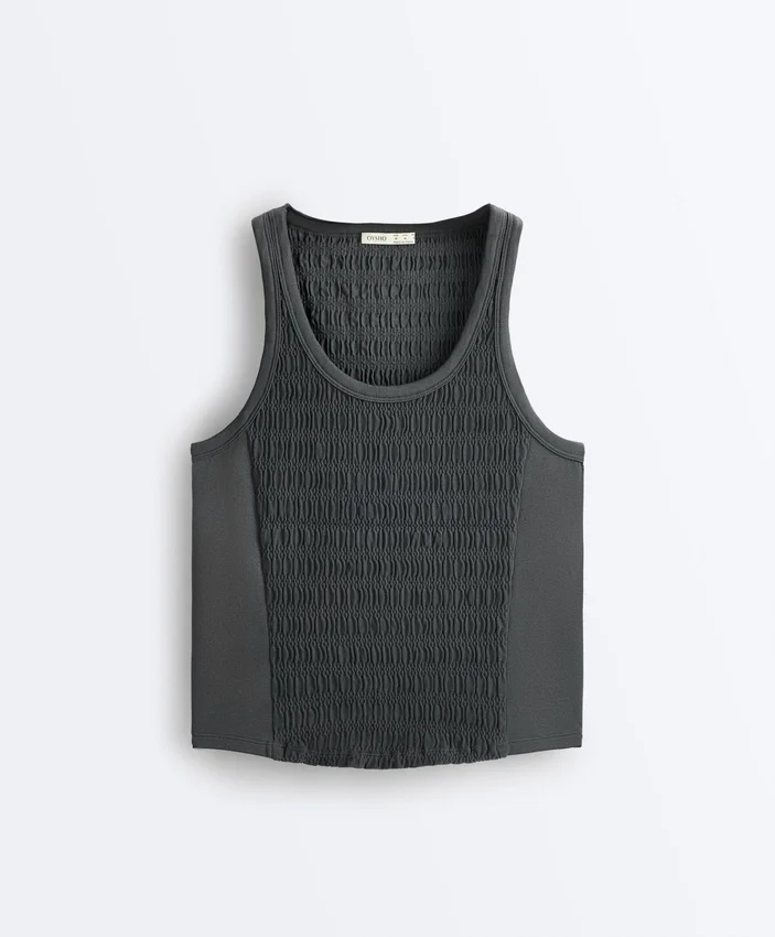 T-shirt senza maniche smockata senza cuciture T-shirt senza maniche smockata senza cuciture