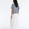 T-shirt squadrata a maniche corte in misto cotone a righe T-shirt squadrata a maniche corte in misto cotone a righe