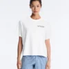T-shirt squadrata in misto cotone con slogan T-shirt squadrata in misto cotone con slogan